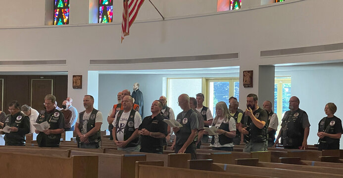 Catholic Cross Bearers Motorcycle Ministry stop at parish for Mass and a blessing