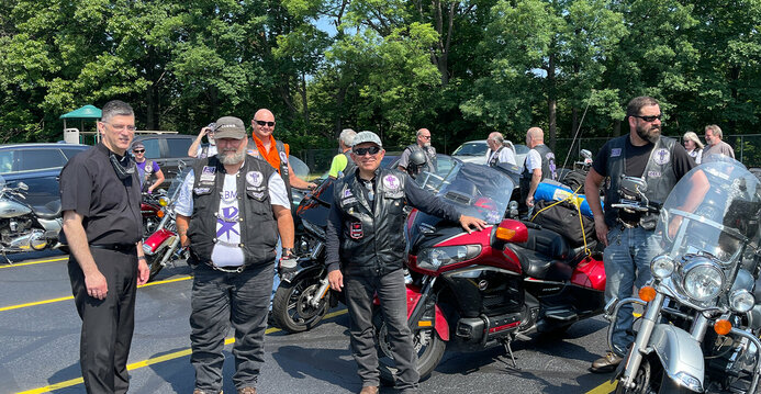 Catholic Cross Bearers Motorcycle Ministry stop at parish for Mass and a blessing