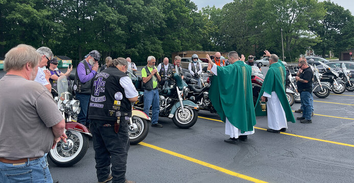 Catholic Cross Bearers Motorcycle Ministry stop at parish for Mass and a blessing