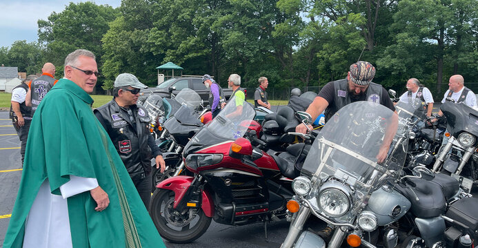 Catholic Cross Bearers Motorcycle Ministry stop at parish for Mass and a blessing