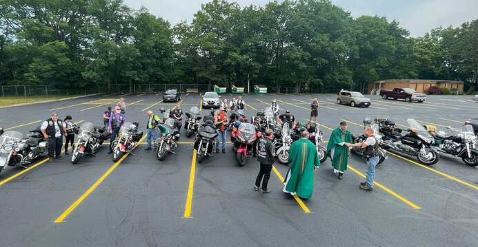 Catholic Cross Bearers Motorcycle Ministry stop at parish for Mass and a blessing