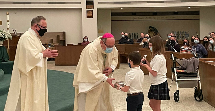 Installation Mass brings together parish's past, present and looks to the future