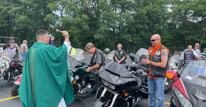 Catholic Cross Bearers Motorcycle Ministry stop at parish for Mass and a blessing